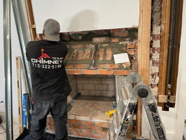 Texas Chimney LLC crew is working on fireplace installation in a Houston home