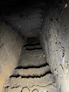 Chimney with soot and debris