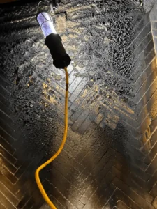 Chimney being cleaned with specialized equipment
