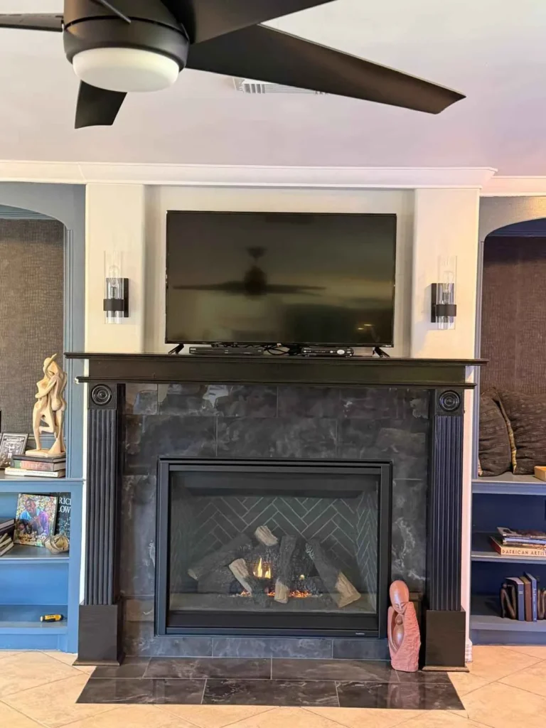 an interior living space featuring a fireplace as the central focal point.